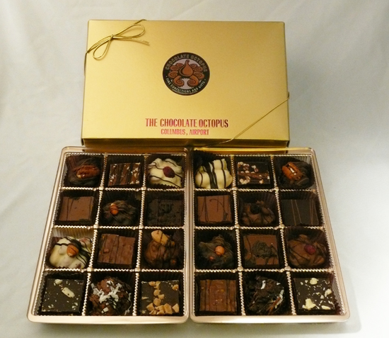 Signature Chocolates - Assortment | 24 Piece Box - An assortment of twenty-four pieces of our best selling hand made Signature Chocolates in a deluxe signature gold box. Designer decorated and made fresh every day, this is a safe gift that will always be in good taste.	